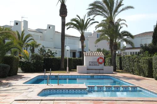Ferienhaus in Denia, Las Marinas, Sandstrand unter 50 m, Gemeinschaftspool, Klimaanlage