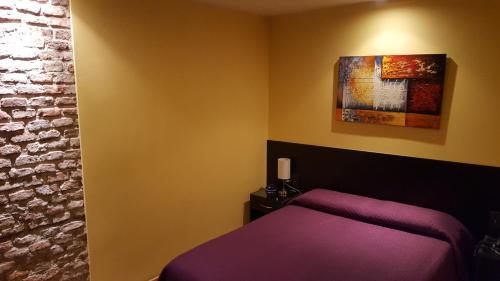 Cama o camas de una habitación en Sur Hotel