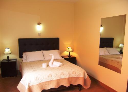 Hotel Conquistadorにあるベッド