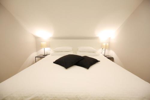 Katil atau katil-katil dalam bilik di Apartman Baredine