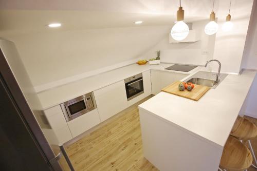 Dapur atau dapur kecil di Apartman Baredine