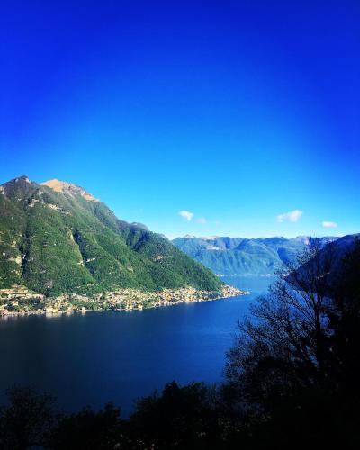 a view of a large body of water with mountains at B&B Villa le Ortensie in Faggeto Lario 