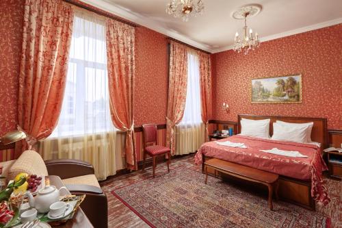 Кровать или кровати в номере Отель Рублев