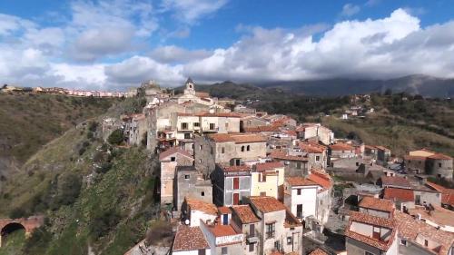 an aerial view of a village on a mountain at The Lemon Tree House in Scalea