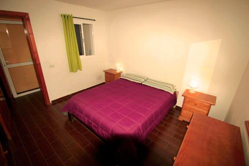 Ένα ή περισσότερα κρεβάτια σε δωμάτιο στο Holiday Cottage Santa Lucía