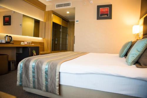 Katil atau katil-katil dalam bilik di Efeler Hotel