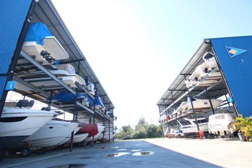 a group of boats parked inside of a building at Samba Angra dos Reis in Angra dos Reis