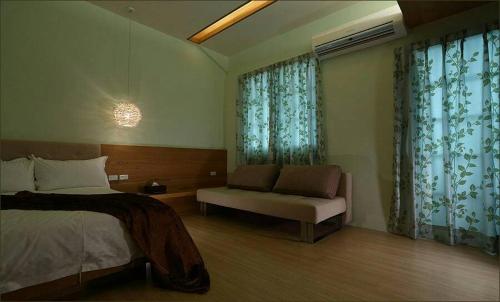 Postel nebo postele na pokoji v ubytování Pretty B&B