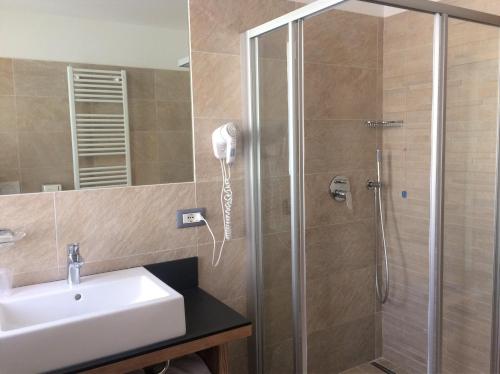 Ванная комната в Hotel Serena