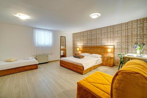 Postel nebo postele na pokoji v ubytování Hotel Skradinski Buk