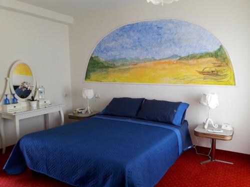 A bed or beds in a room at Hotel Nautilus
