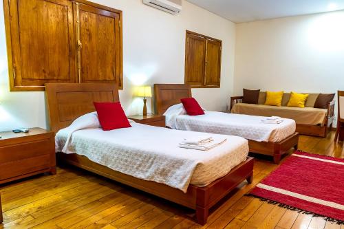 Postel nebo postele na pokoji v ubytování Hostel Carvalho