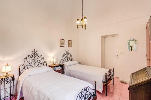 Ένα ή περισσότερα κρεβάτια σε δωμάτιο στο B&B "i Magi"