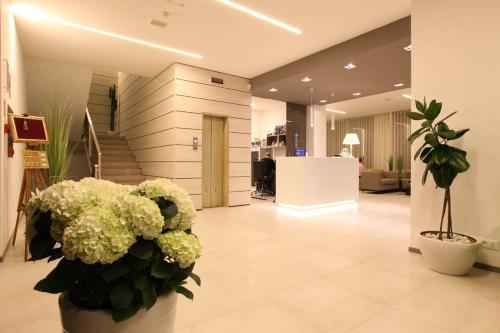 The lobby or reception area at Hotel Derby S