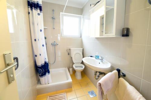 Koupelna v ubytování Apartments Galic