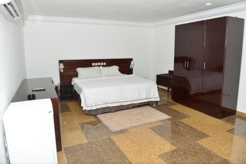 Ein Bett oder Betten in einem Zimmer der Unterkunft Hotel Novela Star