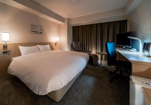 다이와 로이넷 호텔 하카타-기온 객실 침대