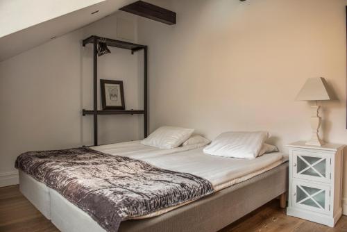 Un ou plusieurs lits dans un hébergement de l'établissement Donners Hotell