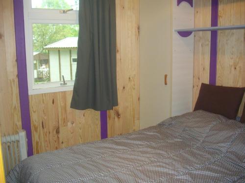 Katil atau katil-katil dalam bilik di Les chalets d'Alzen