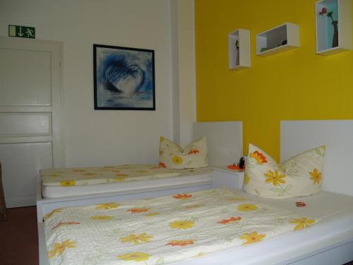 Ένα ή περισσότερα κρεβάτια σε δωμάτιο στο Ferienwohnung Eschenbeek