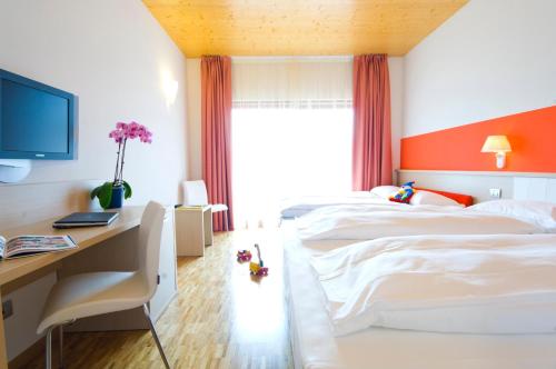 Katil atau katil-katil dalam bilik di Garda Sporting Club Hotel