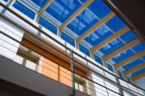a view of the roof of a building with windows at Garda Sporting Club Hotel in Riva del Garda