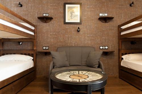 Ένα ή περισσότερα κρεβάτια σε δωμάτιο στο Hostel-Albergue Monte Perdido