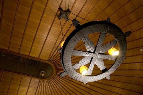 a chandelier hanging from a ceiling in a room at Fuji Lake Hotel in Fujikawaguchiko