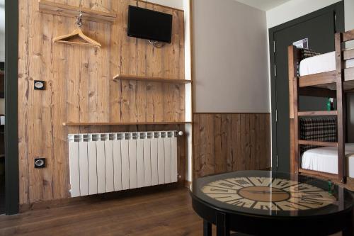 Μια τηλεόραση ή/και κέντρο ψυχαγωγίας στο Hostel-Albergue Monte Perdido