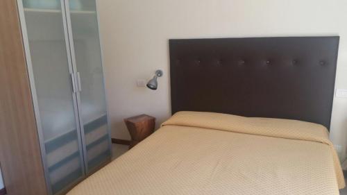 Postel nebo postele na pokoji v ubytování Hotel ILLI