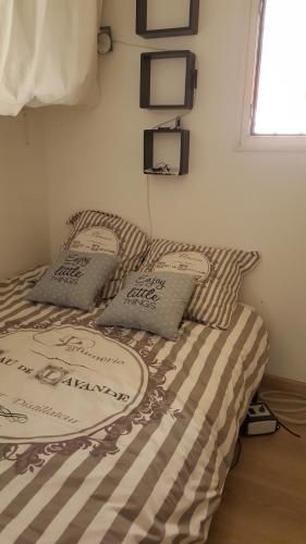 Postel nebo postele na pokoji v ubytování Appartement Charmant Vélusine