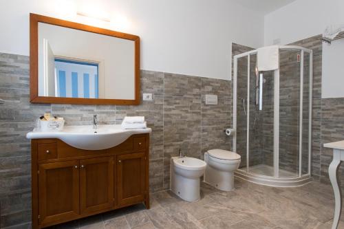 Ένα μπάνιο στο Les Suites Magnolia