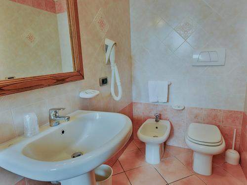 Ванная комната в Hotel Villa Miralisa