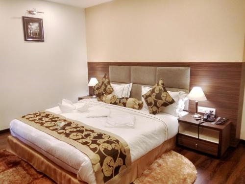 Ένα ή περισσότερα κρεβάτια σε δωμάτιο στο Pearl Retreat