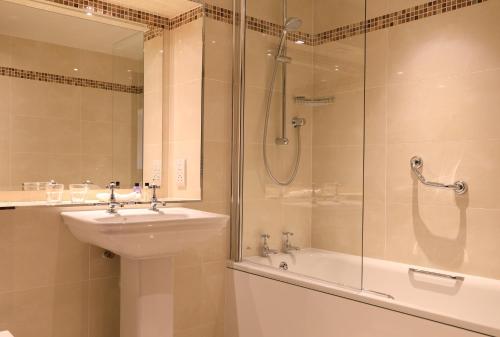 A bathroom at Macdonald Forest Hills Hotel & Spa
