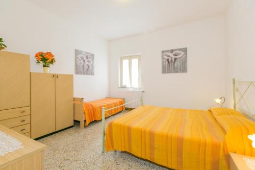 Ένα ή περισσότερα κρεβάτια σε δωμάτιο στο Agriturismo Case Nuove