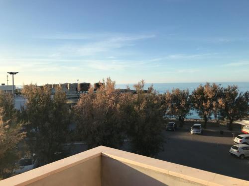 a view from the balcony of a parking lot at Il Mare di Giò in Monopoli