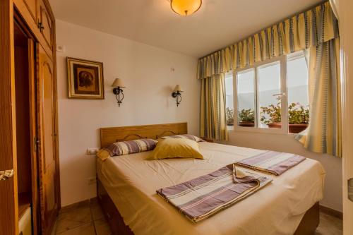 A bed or beds in a room at Casa Charlotte