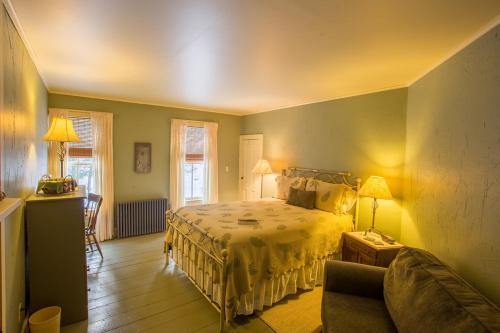 Ένα ή περισσότερα κρεβάτια σε δωμάτιο στο Snow Goose Bed and Breakfast