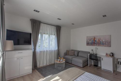 Kuchyň nebo kuchyňský kout v ubytování Priuli Suites
