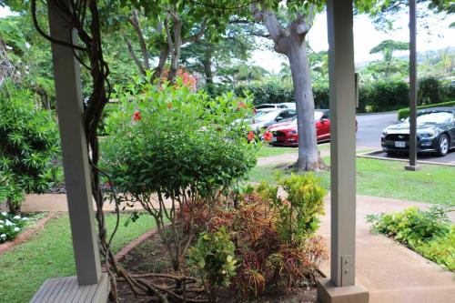 a park with cars parked in a parking lot at Wailea Sunset Condo - Ekolu #607 in Wailea