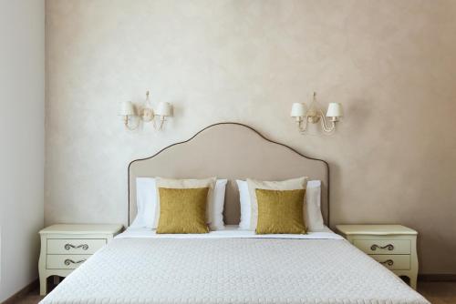 Postel nebo postele na pokoji v ubytování Hotel Hermes Budva