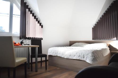 Posteľ alebo postele v izbe v ubytovaní Vila Premijer Divčibare