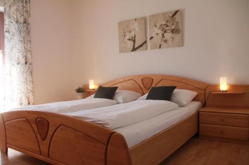 Haus Meissnitzer tesisinde bir odada yatak veya yataklar