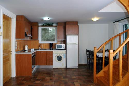 Kuchyň nebo kuchyňský kout v ubytování Kydonies Villas