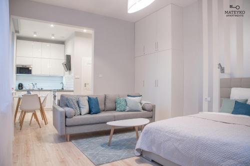Posteľ alebo postele v izbe v ubytovaní Mateyko Apartment