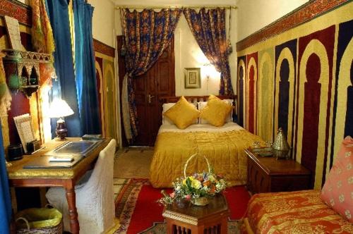 Voodi või voodid majutusasutuse Riad Dalia toas