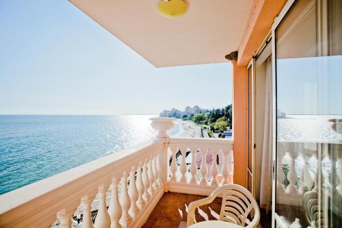 a balcony with a view of the ocean at Royal Bay Hotel - All Inclusive in Elenite