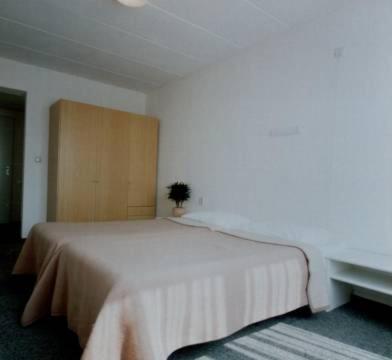Een bed of bedden in een kamer bij Hotel Lahaye