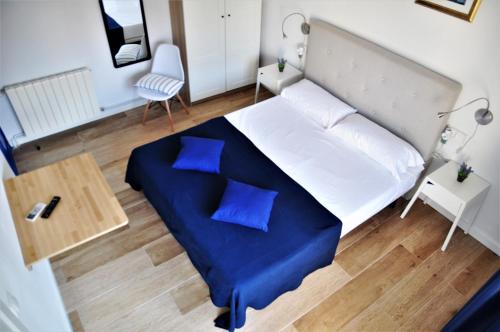 Katil atau katil-katil dalam bilik di Hostal Porto Mar